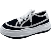 Zapatillas Egirl de suela gruesa con líneas de contraste en blanco y negro
